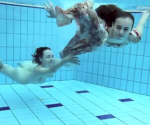 Two hot hairy beauties underwater